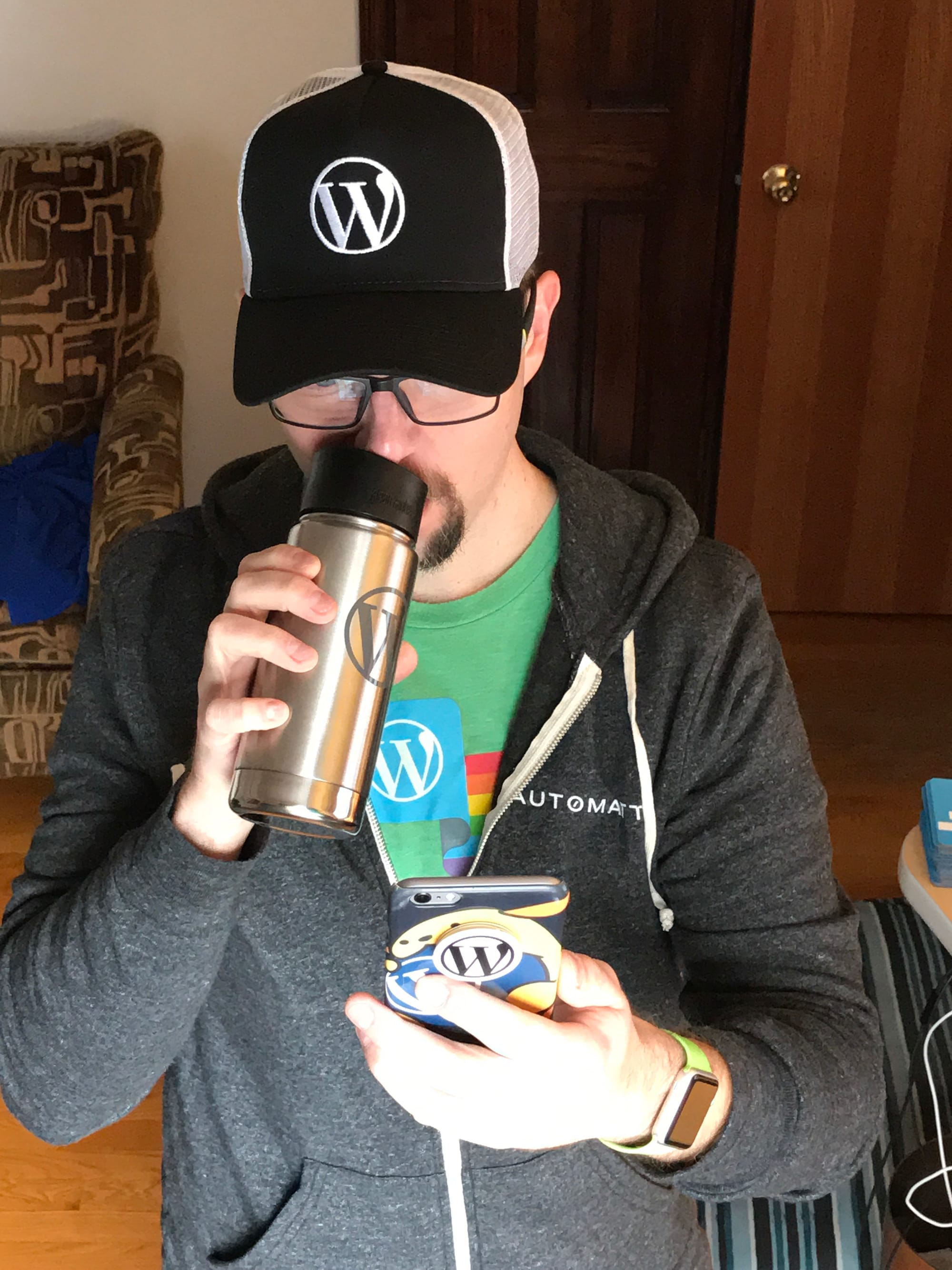 Me wearing a ton of Automattic and WordPress swag